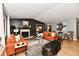 Bright living room featuring a cozy fireplace, modern decor, and an open floor plan for Gathering gatherings at 2456 N Willow Way, Indianapolis, IN 46268