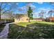 A grassy backyard with a house in the background at 3011 S 550 W, Columbus, IN 47201
