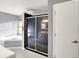 Relaxing bathroom with a tub, shower and vanity, complemented by natural light at 3011 S 550 W, Columbus, IN 47201