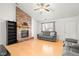 Inviting living room featuring hardwood floors, a gray sofa, and neutral walls at 3121 River Birch Dr, Indianapolis, IN 46235