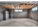 Unfinished basement with painted walls at 3416 Guilford Ave, Indianapolis, IN 46205
