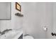 Cozy half bathroom featuring a modern sink, sleek faucet, and fresh paint at 3416 Guilford Ave, Indianapolis, IN 46205
