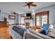 Bright living room featuring hardwood floors, a fireplace, and natural lighting at 3416 Guilford Ave, Indianapolis, IN 46205