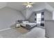 Cozy bedroom with a ceiling fan, neutral colored walls and carpet, and natural light from window at 4034 W 700 S, Shelbyville, IN 46176