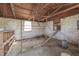 Interior view of a well-maintained chicken coop featuring a window and roosting areas at 4034 W 700 S, Shelbyville, IN 46176