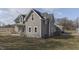 A house with an open backyard, side deck, and a fantastic architectural design at 4034 W 700 S, Shelbyville, IN 46176