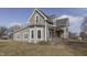 A beautifully renovated home with great features, including a lovely front porch at 4034 W 700 S, Shelbyville, IN 46176