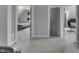 Hallway featuring carpet, access to bedroom and office at 4034 W 700 S, Shelbyville, IN 46176