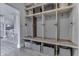 Well-organized mudroom with custom storage lockers, baskets, and neutral decor at 4034 W 700 S, Shelbyville, IN 46176