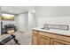Basement kitchenette with sink, and exercise area offer convenience and healthy living at 4905 Andover Pkwy, Westfield, IN 46062