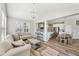 Open concept floor plan showcasing living room and kitchen; perfect for modern living and entertaining at 4905 Andover Pkwy, Westfield, IN 46062