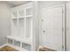 Bright mudroom features built-in storage cubbies, coat hooks, and a convenient bench for organization at 4905 Andover Pkwy, Westfield, IN 46062