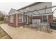 Spacious back patio with elegant pergola, offering a perfect outdoor living area with a grill at 5328 Kidwell Cir, Indianapolis, IN 46239