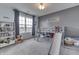 Playful ' bedroom with a bunk bed and a slide, featuring Star Wars decorations and ample space at 5328 Kidwell Cir, Indianapolis, IN 46239