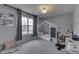 Inviting bedroom featuring stylish house bed frame and large window with natural light at 5328 Kidwell Cir, Indianapolis, IN 46239