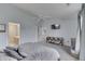 Bedroom with TV, ceiling fan, and neutral color scheme at 5328 Kidwell Cir, Indianapolis, IN 46239