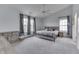 Spacious bedroom with vaulted ceiling, plush carpet, and neutral color scheme at 5328 Kidwell Cir, Indianapolis, IN 46239