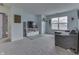 Cozy living room with a TV, entertainment center, and a comfortable gray sectional sofa at 5328 Kidwell Cir, Indianapolis, IN 46239
