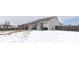 Wide view of backyard with cozy patio featuring a metal pergola over outdoor seating, grill, and fencing at 5443 Alcott Ln, Indianapolis, IN 46221