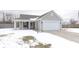 Inviting one-story home with a covered front porch and well-maintained lawn, ready for new memories at 5443 Alcott Ln, Indianapolis, IN 46221