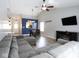Open floor plan with living room, dining area, and entryway showcasing a modern design at 5443 Alcott Ln, Indianapolis, IN 46221
