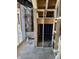 Interior view of a framed-in home with HVAC and plumbing installed, showcasing an open concept design at 5740 Birtz Rd, Lawrence, IN 46216