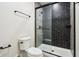 Modern bathroom features walk-in shower with black accents at 580 Exmoor Dr, Carmel, IN 46032
