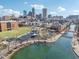 Scenic view of city skyline, community park, and homes from above on a clear, sunny day at 645 Ellsworth St, Indianapolis, IN 46202