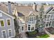 Residential neighborhood featuring well-maintained homes with varying roof styles and landscaping designs at 645 Ellsworth St, Indianapolis, IN 46202