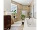 Bathroom features walk-in shower, soaking tub, and dark wood vanity at 645 Ellsworth St, Indianapolis, IN 46202