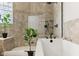 Bathroom with tiled walk-in shower and soaking tub at 645 Ellsworth St, Indianapolis, IN 46202