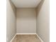 Interior closet space with neutral carpeting and walls at 645 Ellsworth St, Indianapolis, IN 46202