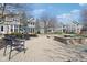Inviting community space featuring a brick patio, comfortable seating, and well-manicured landscaping at 645 Ellsworth St, Indianapolis, IN 46202