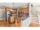 Spacious kitchen featuring wood cabinets, stainless steel appliances, and granite countertops at 645 Ellsworth St, Indianapolis, IN 46202