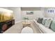 Relaxing living room with a large TV, comfortable sofa, and stylish decor at 645 Ellsworth St, Indianapolis, IN 46202