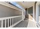 Spacious patio with white railings offering outdoor living space at 645 Ellsworth St, Indianapolis, IN 46202