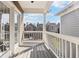 Spacious patio with white railings providing views of the neighborhood at 645 Ellsworth St, Indianapolis, IN 46202