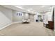 Large recreation room with a dining table and chairs, and ample space for activities at 645 Ellsworth St, Indianapolis, IN 46202
