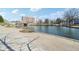 Relaxing waterfront view featuring a tranquil pond and pedestrian-friendly brick walkway at 645 Ellsworth St, Indianapolis, IN 46202