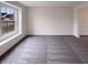 Bright bedroom with neutral paint and a large window at 6454 Waterstone Dr, Indianapolis, IN 46268