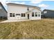 Spacious backyard with a patio and ample room for outdoor activities at 6457 Flag Stop Dr, Whitestown, IN 46075