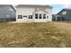 Large backyard with a patio, perfect for outdoor entertaining and relaxation at 6457 Flag Stop Dr, Whitestown, IN 46075