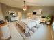 Beautiful bedroom featuring a plush bed, neutral decor, and plenty of natural light at 7018 Allegan Dr, Indianapolis, IN 46217