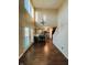 A cozy kitchen boasts a high ceiling, an island with barstool seating, and stainless steel appliances at 7018 Allegan Dr, Indianapolis, IN 46217