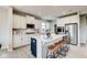 Bright, modern kitchen featuring white cabinets, stainless steel appliances, and a center island with seating at 7348 Deerberg Dr, Indianapolis, IN 46259