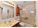 Clean bathroom featuring a shower over bath, vanity sink, and a medicine cabinet at 8221 Furlong Cir, Indianapolis, IN 46256