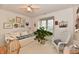Cozy bedroom with a daybed, soft decor, and natural light, creating a relaxing and inviting atmosphere at 8221 Furlong Cir, Indianapolis, IN 46256