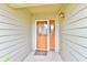 Welcoming front porch with a decorative door, and a 'Welcome' mat, creating a warm and inviting entrance at 8221 Furlong Cir, Indianapolis, IN 46256