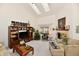 Bright living room with vaulted ceilings, fireplace, and cozy furniture arrangement, perfect for relaxing at 8221 Furlong Cir, Indianapolis, IN 46256