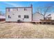 Backyard view of a two-story home, showing the deck and yard space at 9318 Drawbridge Ct, Indianapolis, IN 46250